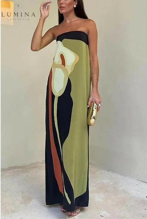 Green Marceline summer dress by Lumina Wear, featuring lightweight fabric and a flowing style perfect for warm weather.