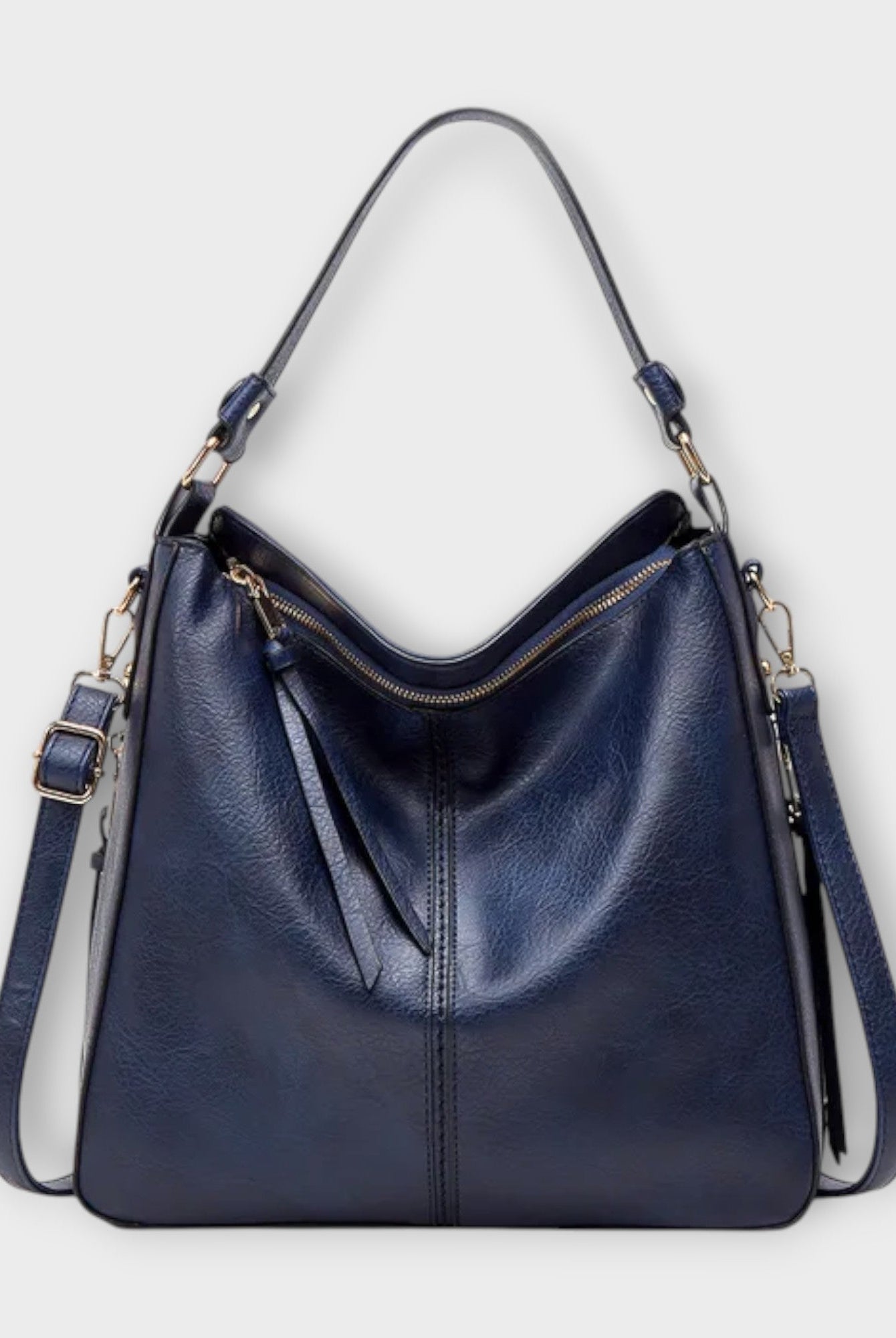 Black Lumina Wear Margaux slouchy hobo handbag with versatile straps, showing its relaxed shape and stylish design.