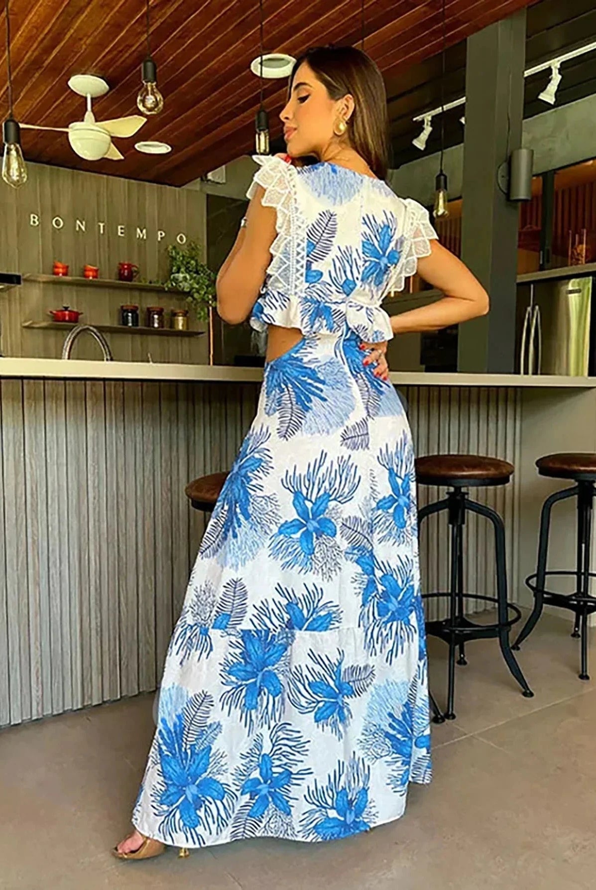 Blue sleeveless lace maxi dress by Lumina Wear, featuring a trendy, elegant design with intricate lace details.