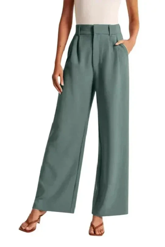 Cream high-waisted wide-leg women's trousers by Lumina Wear featuring a chic, relaxed fit and tailored style.
