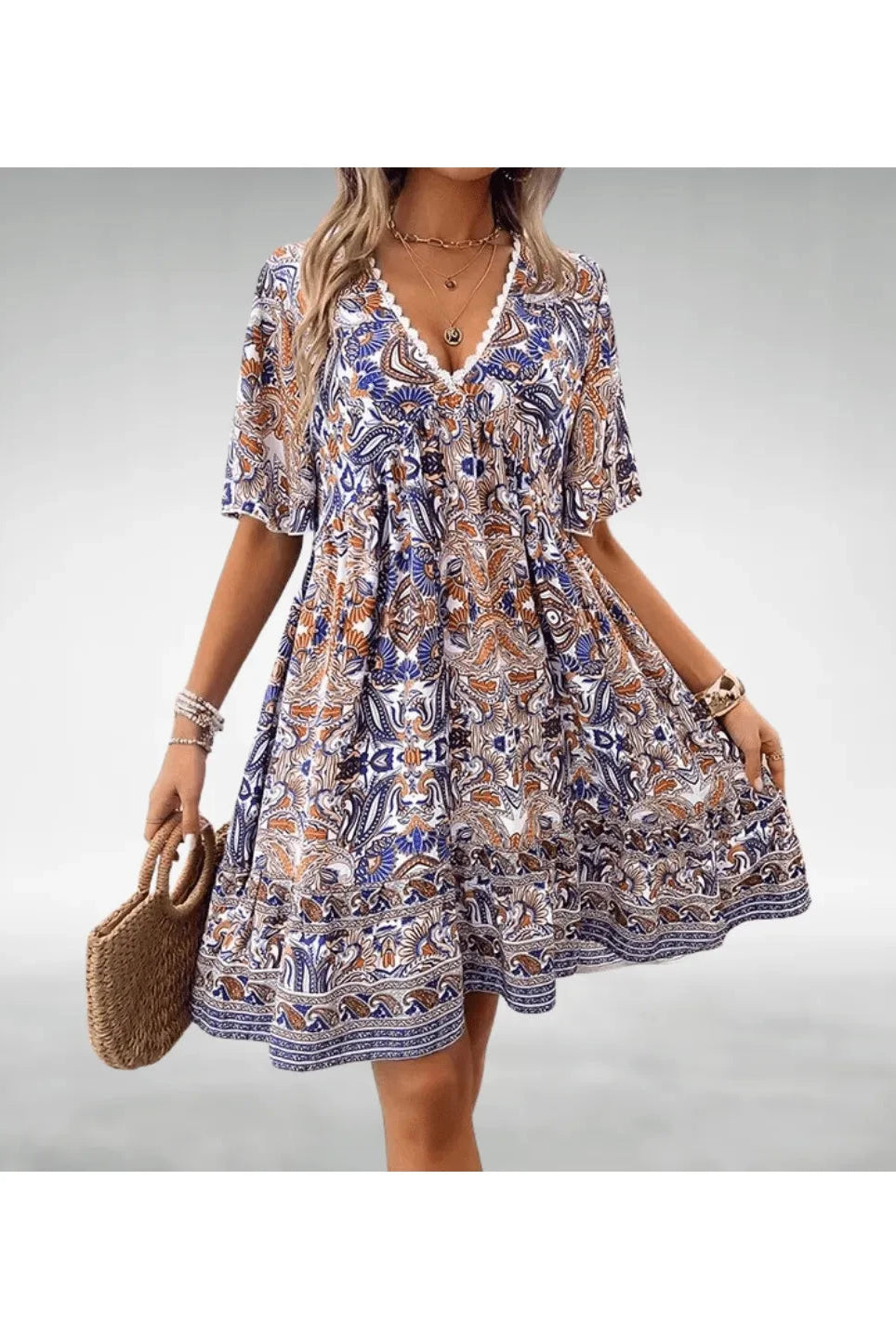 Green Marielle™ boho swing dress by Lumina Wear, featuring flowing fabric and relaxed fit, perfect for casual summer wear.