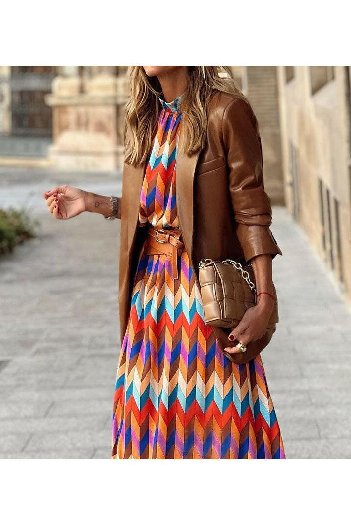 Marisol™ vibrant geometric dress by Lumina Vancouver, featuring bold patterns and a stylish silhouette.