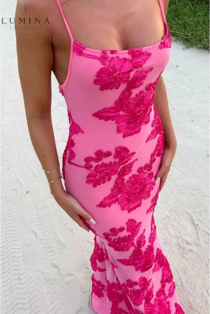 Pink floral knot-strap dress by Lumina Wear, Maritza style, perfect for wedding guests, shown in a close-up on a model.