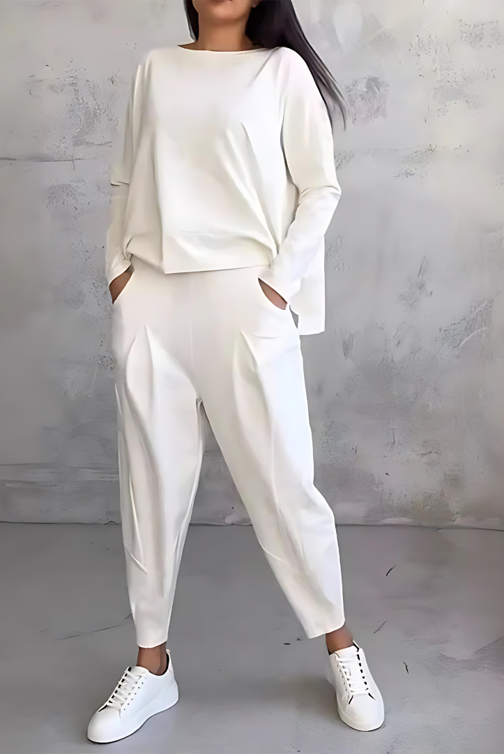 Black Maya flowy lounge set with tapered pants from Lumina Wear, featuring a relaxed fit and comfortable design for women.
