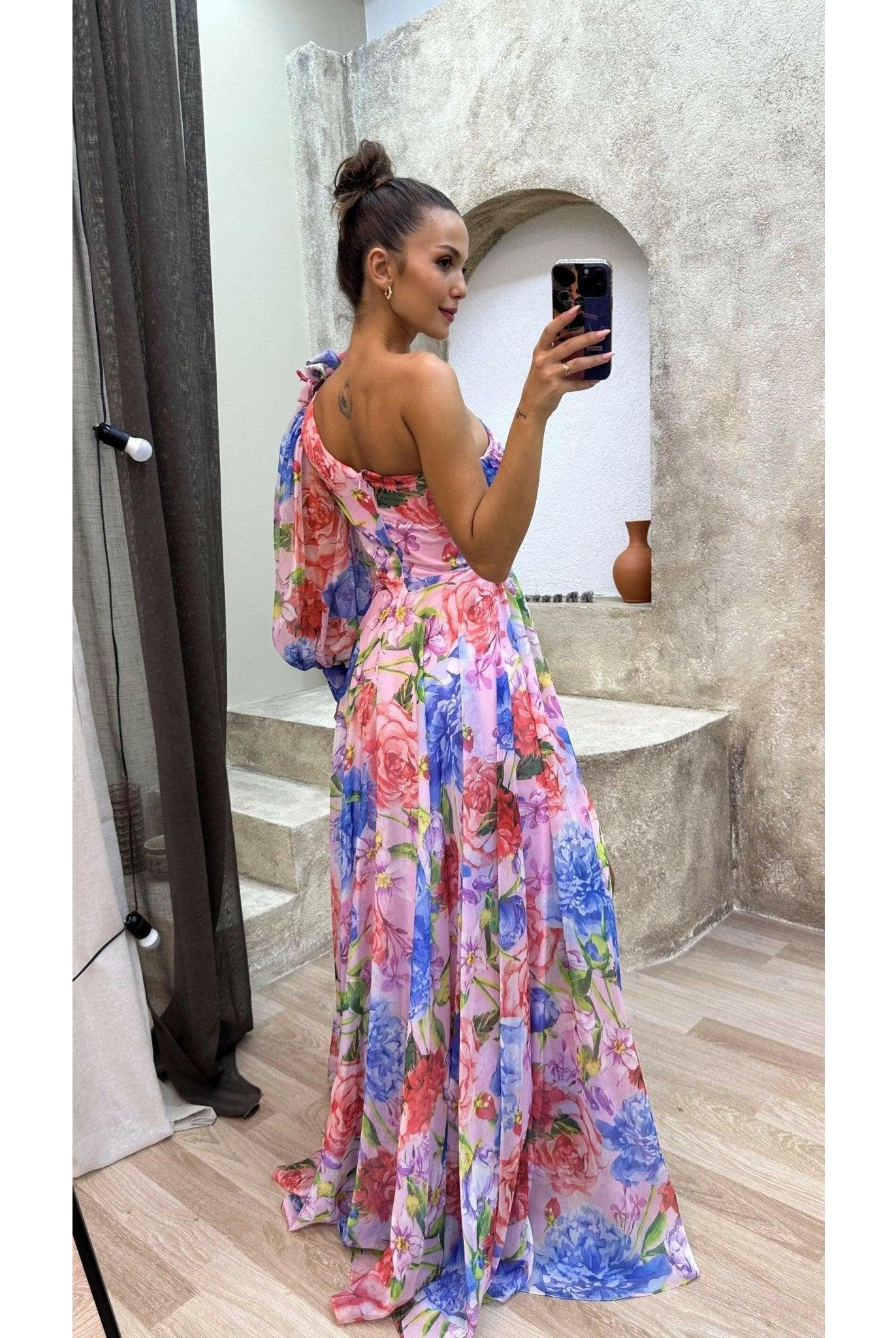 Purple Mckenna evening gown by Lumina Wear featuring a flowing silhouette, perfect for formal occasions and wedding guest attire.