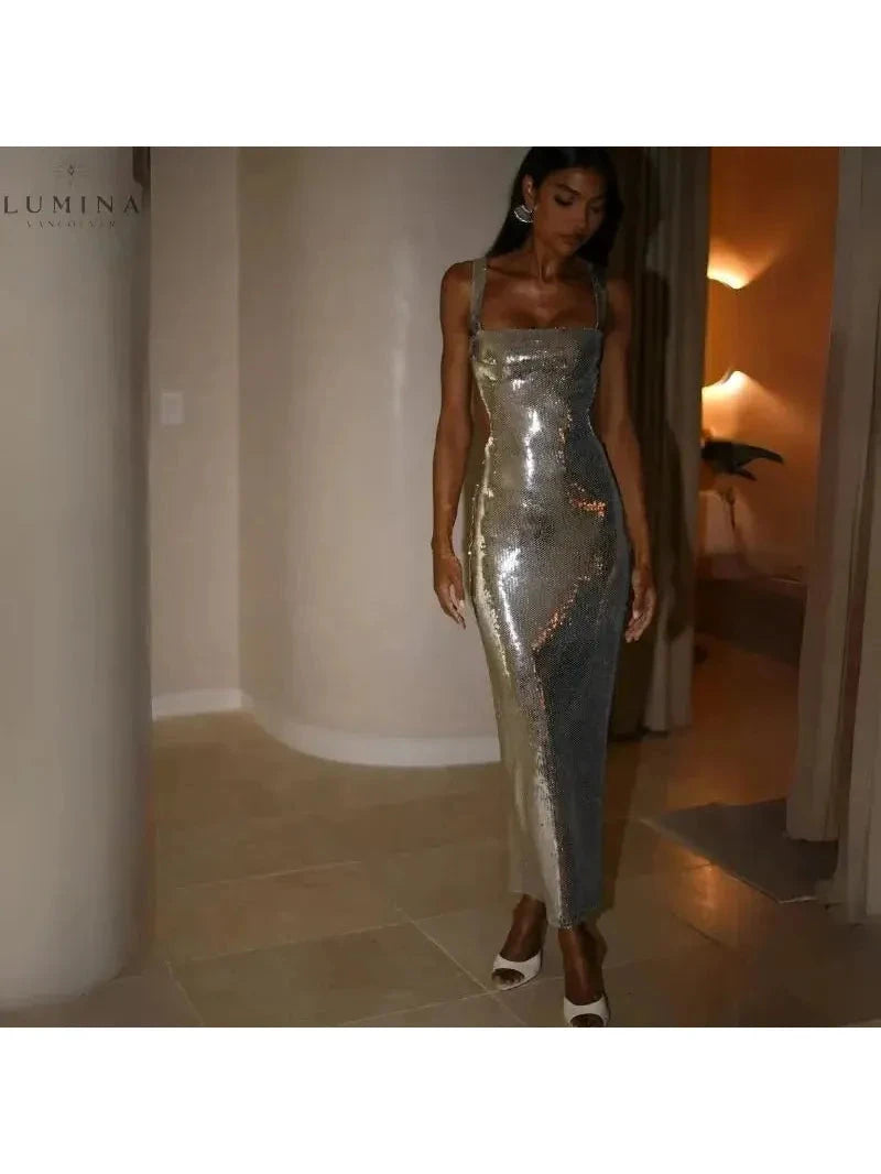 Silver Michaela spaghetti strap shimmer maxi dress by Lumina Vancouver, perfect for girls' night out, shown on a young girl.