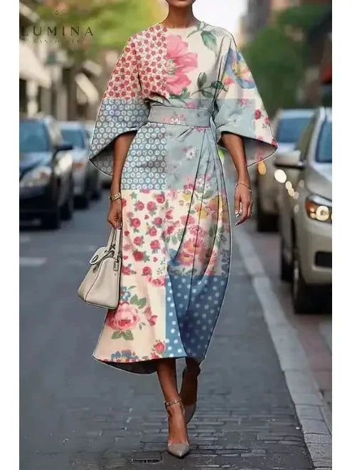 Michelle elegant floral dress by Lumina Wear, showcasing a stylish floral pattern and fitted design, perfect for casual or dressy occasions.