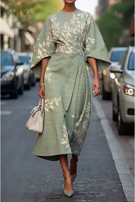 Michelle Lumina Wear elegant floral dress with a flowing design, floral pattern, perfect for stylish occasions.