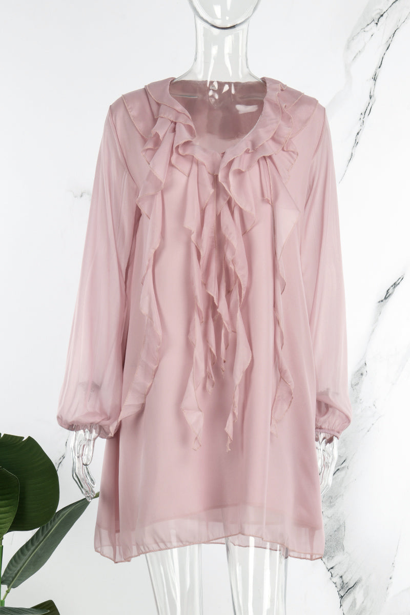 Pink knee-length flowy V-neck dress by Lumina Vancouver, perfect for casual or semi-formal occasions.