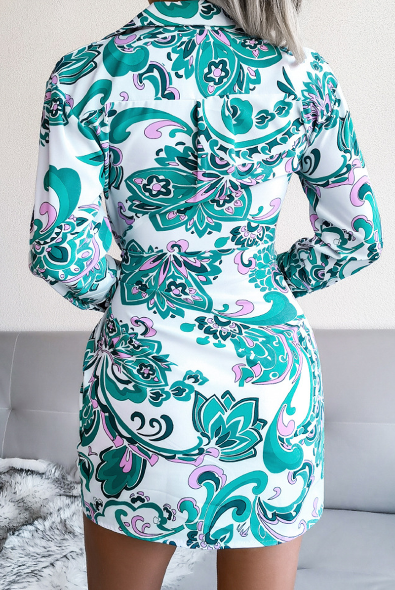 White Mira V-neck wrap mini dress with tie waist by Lumina Vancouver, featuring a stylish and fitted design.