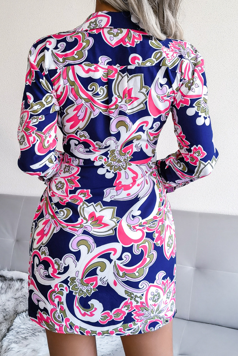 White Mira V-neck wrap dress with tie waist from Lumina Vancouver, styled as a chic mini dress.