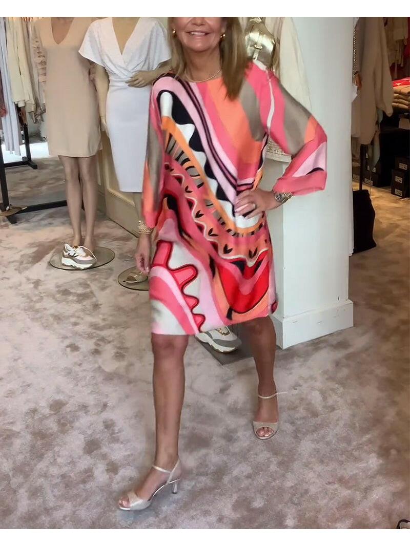 Mirabella™ vibrant abstract print coral pink dress by Lumina Vancouver, stylish and colorful summer dress for women.