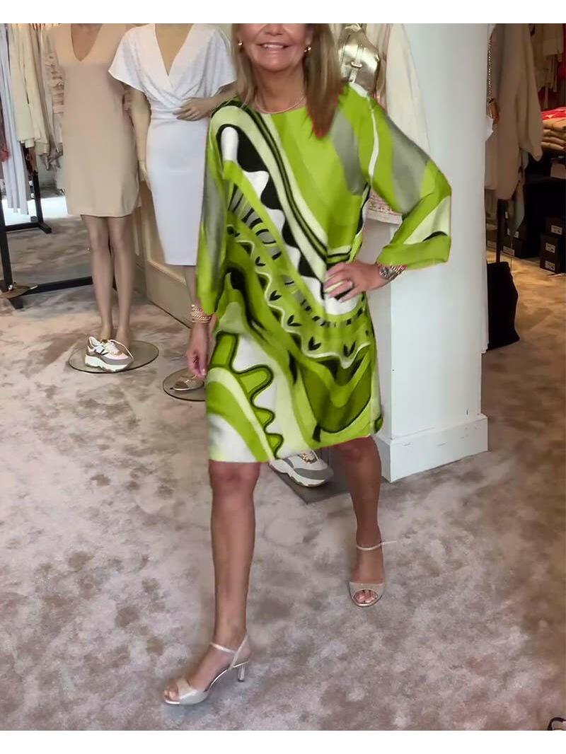 Mirabella™ vibrant abstract print coral pink dress by Lumina Vancouver, stylish and colorful for casual or special occasions.