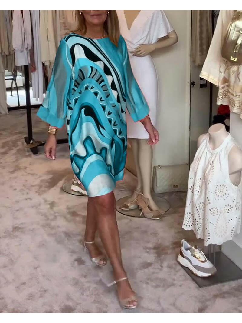 Mirabella™ vibrant abstract print coral pink dress by Lumina Vancouver, stylish and eye-catching for casual or dressy occasions.