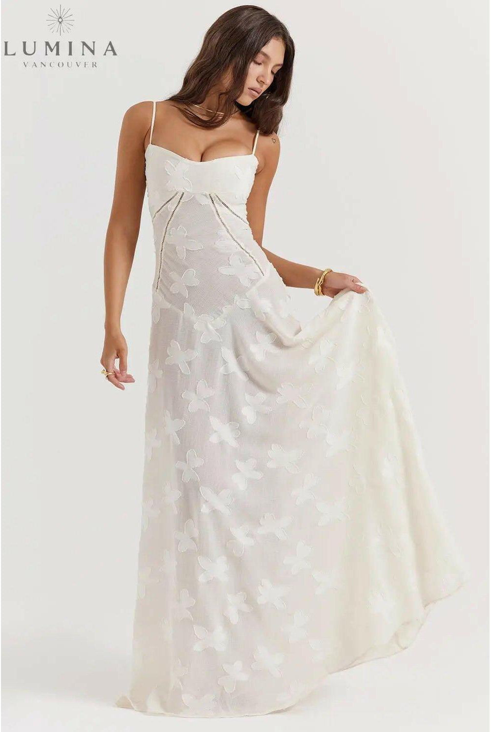 White Mireille Romantic Summer Dress by Lumina Wear, featuring flowy fabric and holiday vibe style, perfect for warm weather.