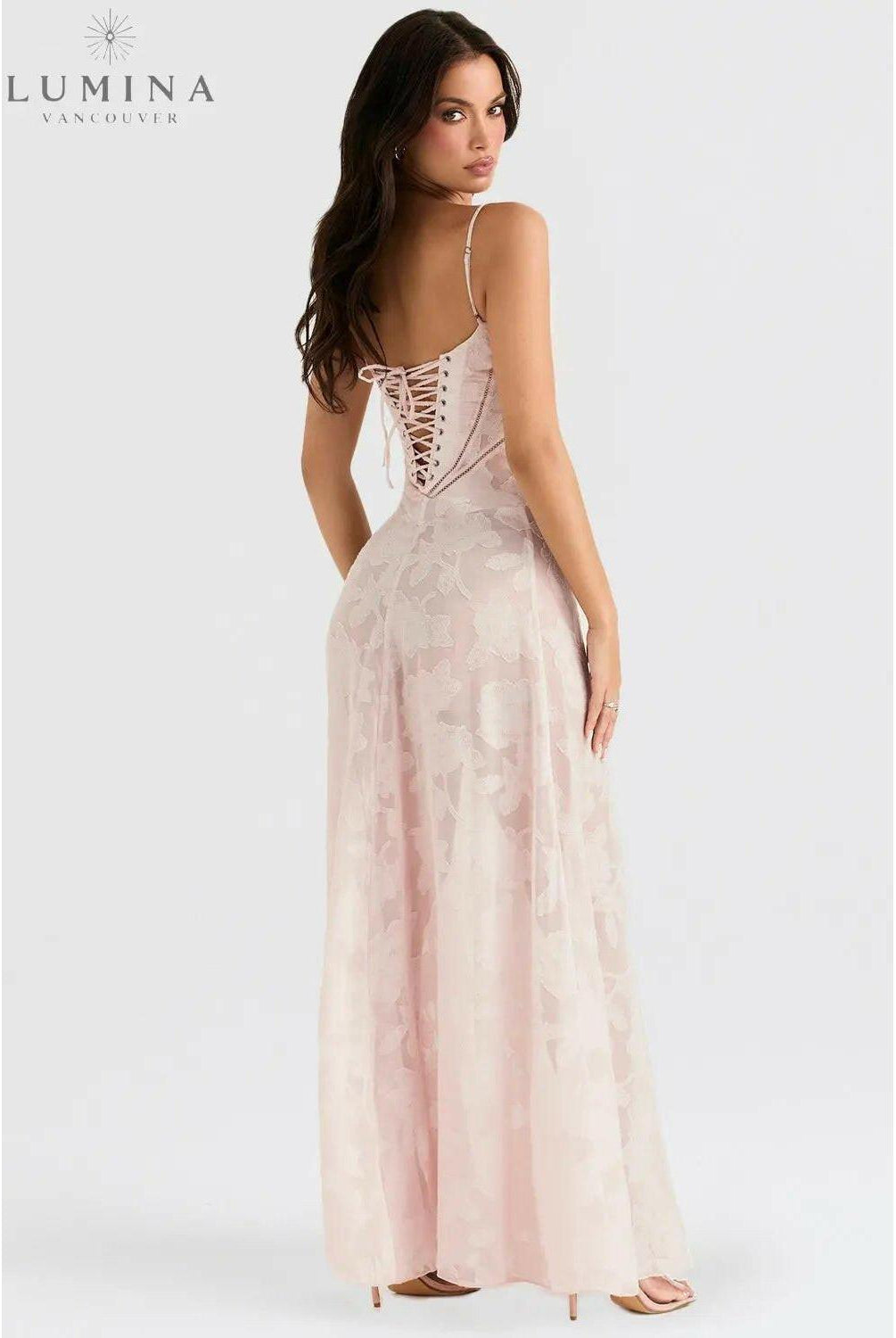White Mireille romantic summer dress by Lumina Wear featuring a flowy design, perfect for sunny holiday vibes.