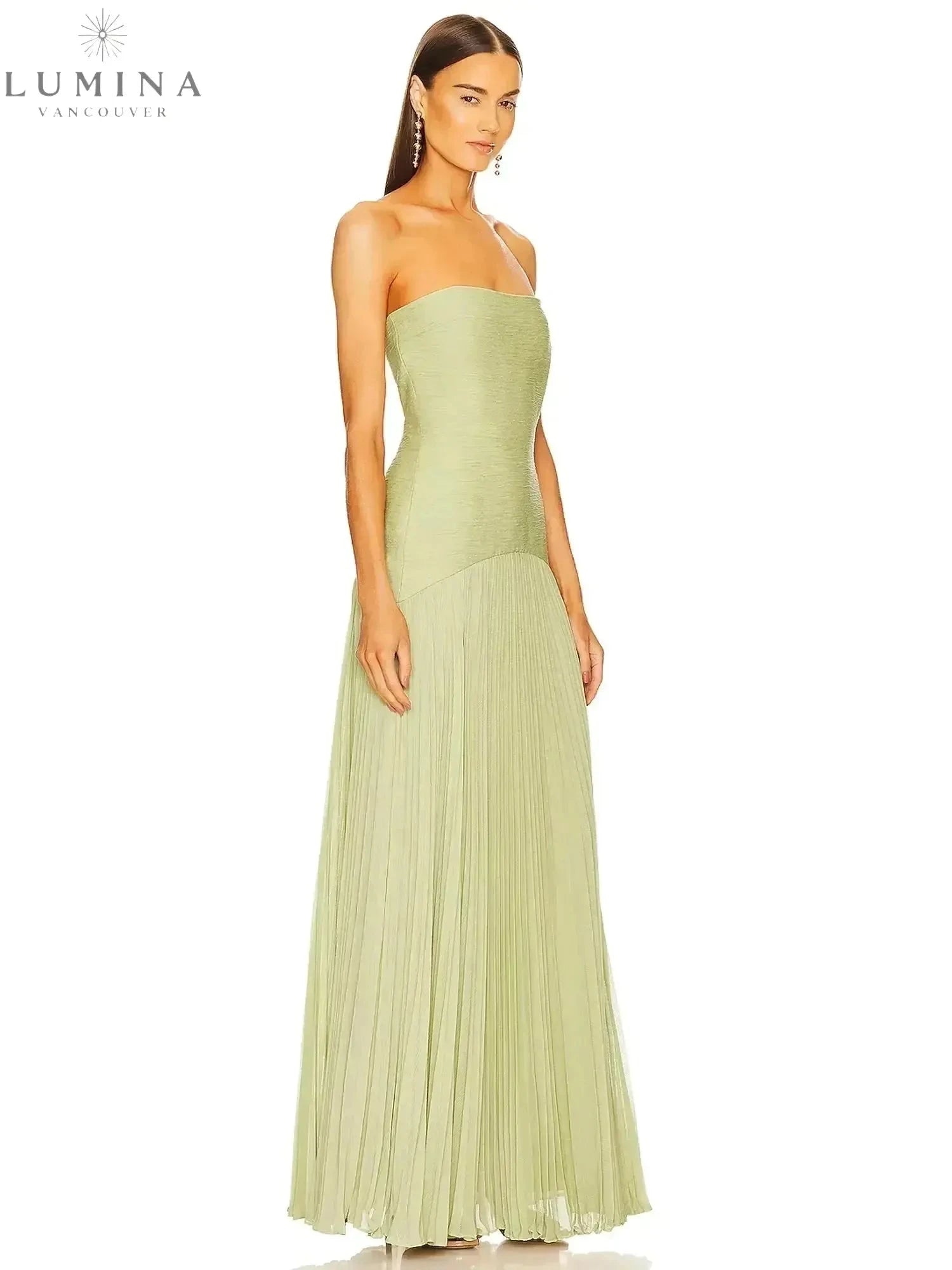 Morgane sleeveless drop-waist maxi dress by Lumina Vancouver, perfect for wedding guests, in elegant fabric with a flowing silhouette.