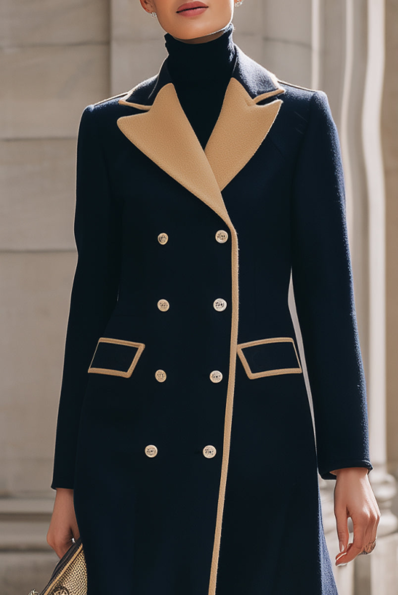 Navy blue Rosamund double-breasted coat by Lumina Vancouver with camel contrast details, shown on a model.