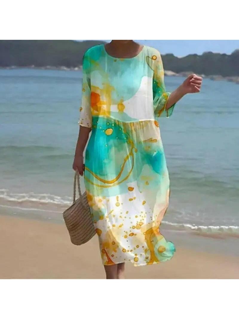 Blue Naia floral dress by Lumina Vancouver featuring a stylish and elegant design, showcased on a model.