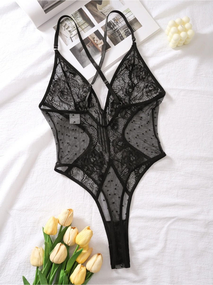 Lumina Vancouver Naomi Josette Bodysuit in size small, featuring a sleek, fitted design with long sleeves and a scoop neckline.