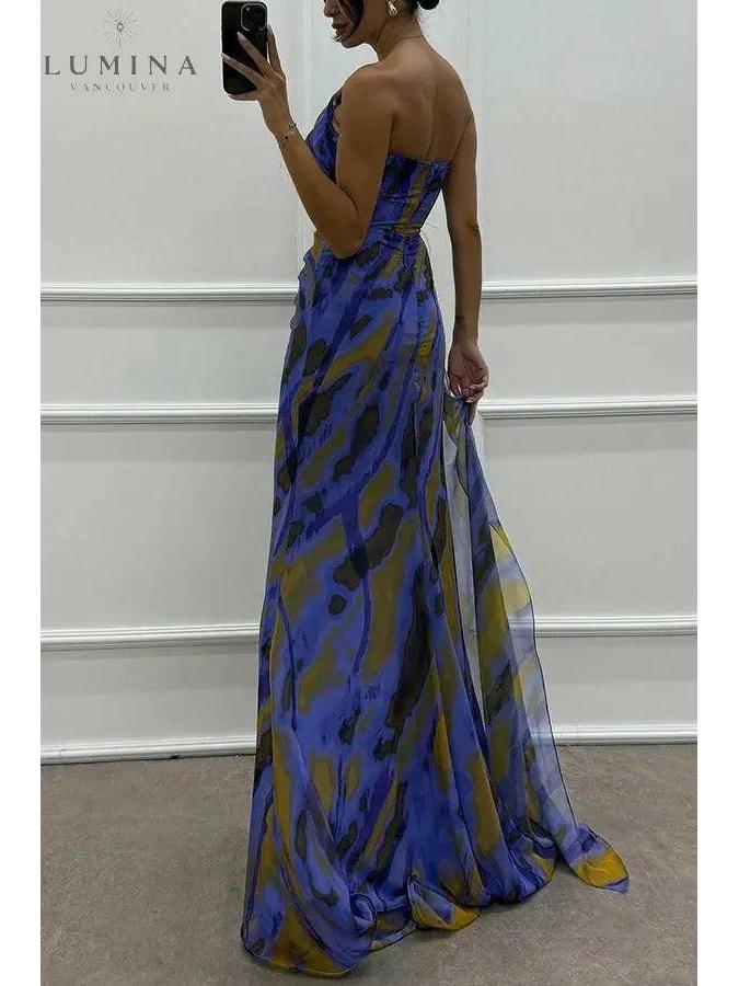 Naomi Iseut vibrant blue maxi dress by Lumina Vancouver, perfect for wedding guests, showcasing flowing fabric and elegant design.