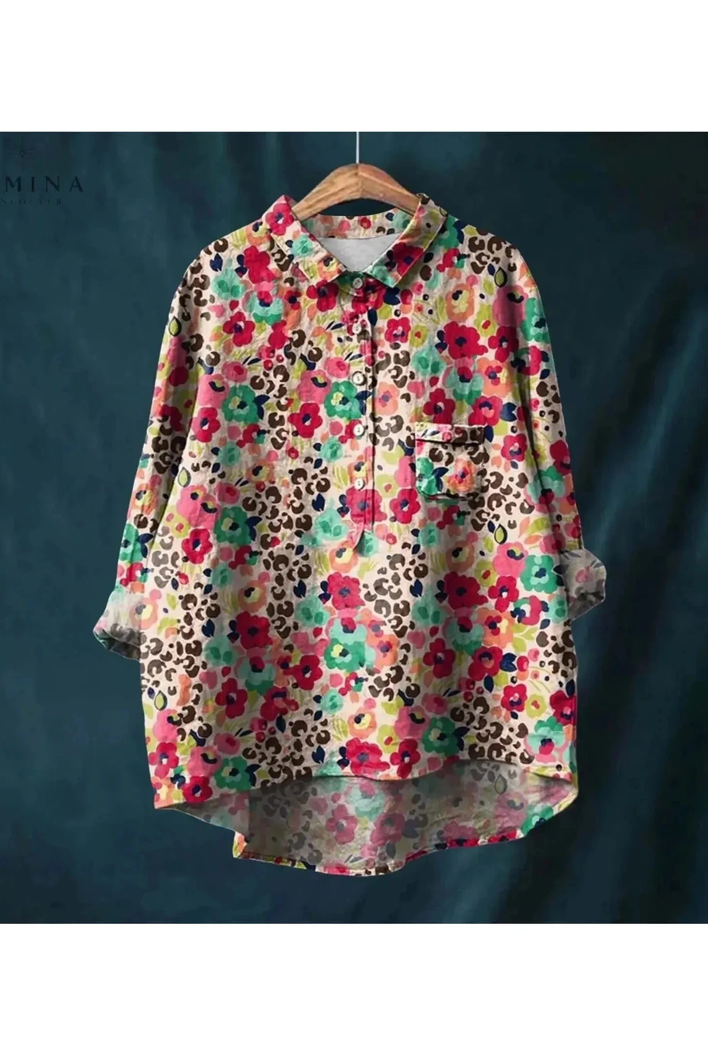 Gray floral blouse named Natasha by Lumina Wear featuring elegant art-inspired floral print, shown on a model.