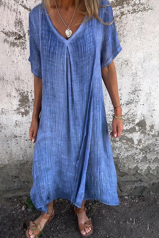Blue Lumina Wear NIA maxi dress with flowing fabric and sleeveless design, perfect for casual or summer wear.
