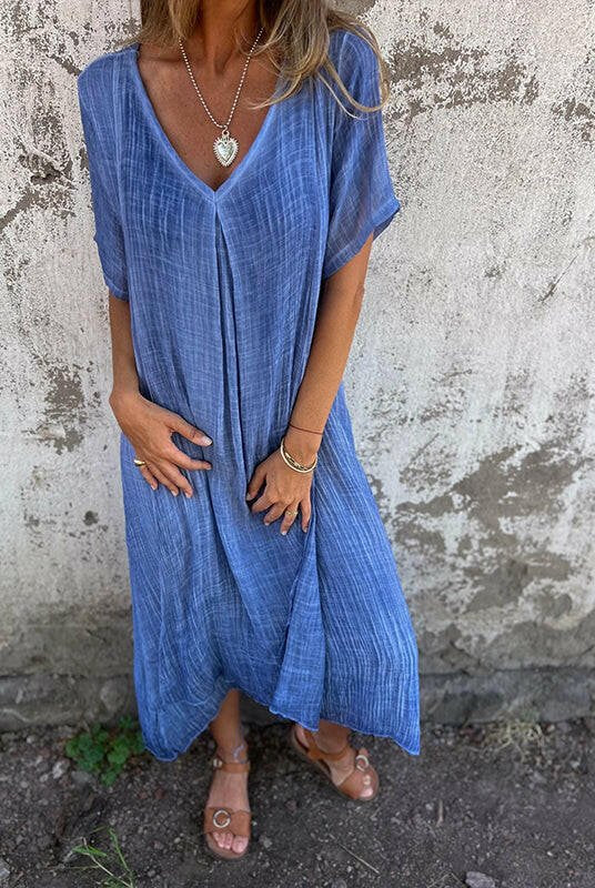 Blue Lumina Wear NIA Maxi Dress with flowing fabric and elegant design, perfect for stylish summer or evening wear.