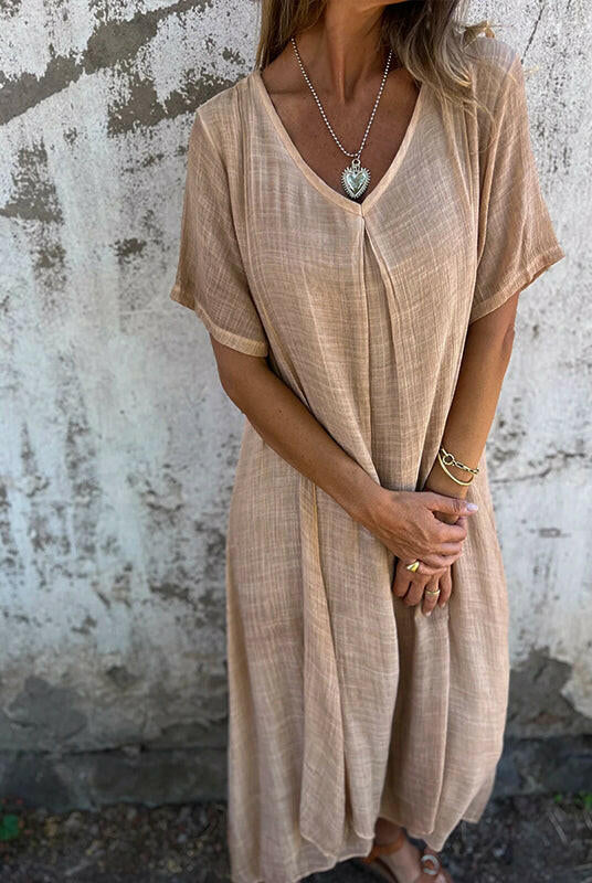 Blue Lumina Wear NIA maxi dress with flowing fabric and sleeveless design, perfect for summer or special occasions.