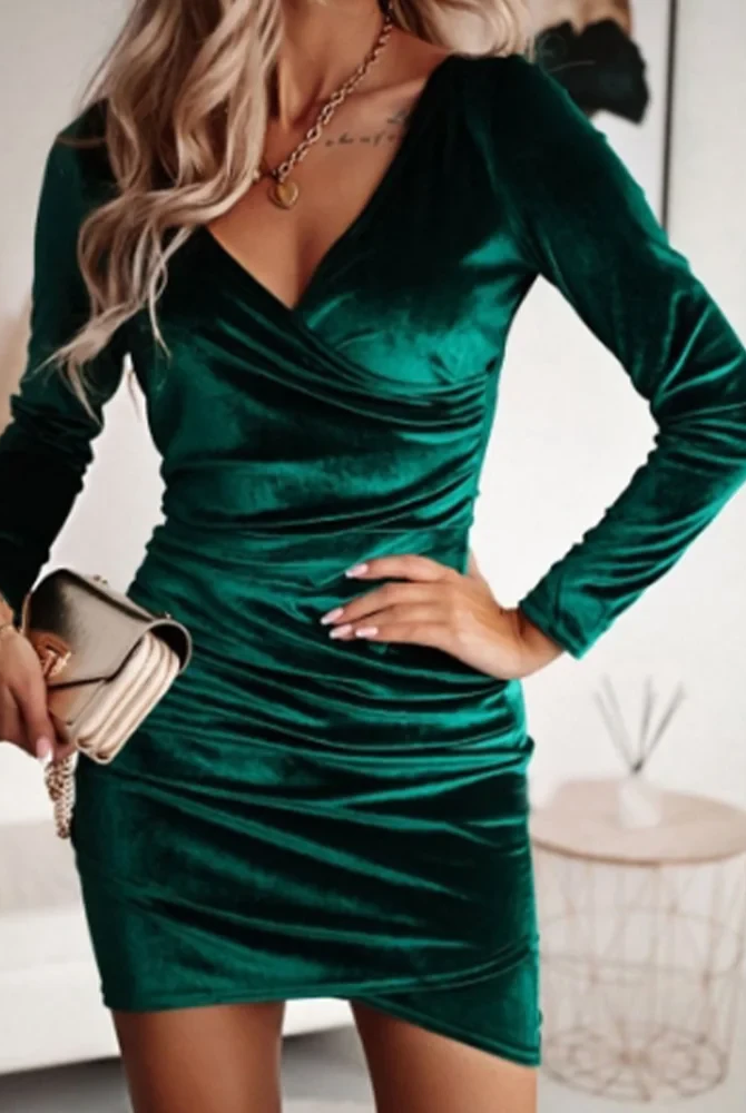Black Nia wrap dress with V-neck and long sleeves by Lumina Vancouver, styled as a chic mini dress.