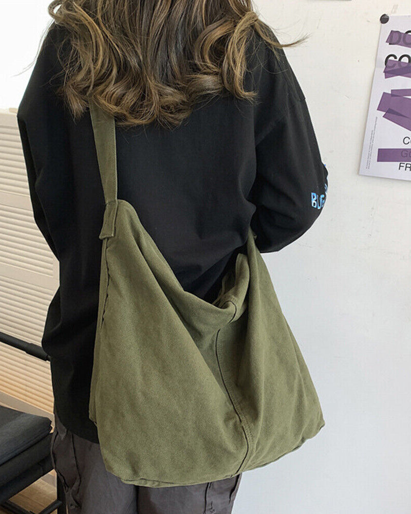 Beige Noa minimalist canvas shoulder bag with oversized design by Lumina Wear, showing its spacious shape and stylish strap.
