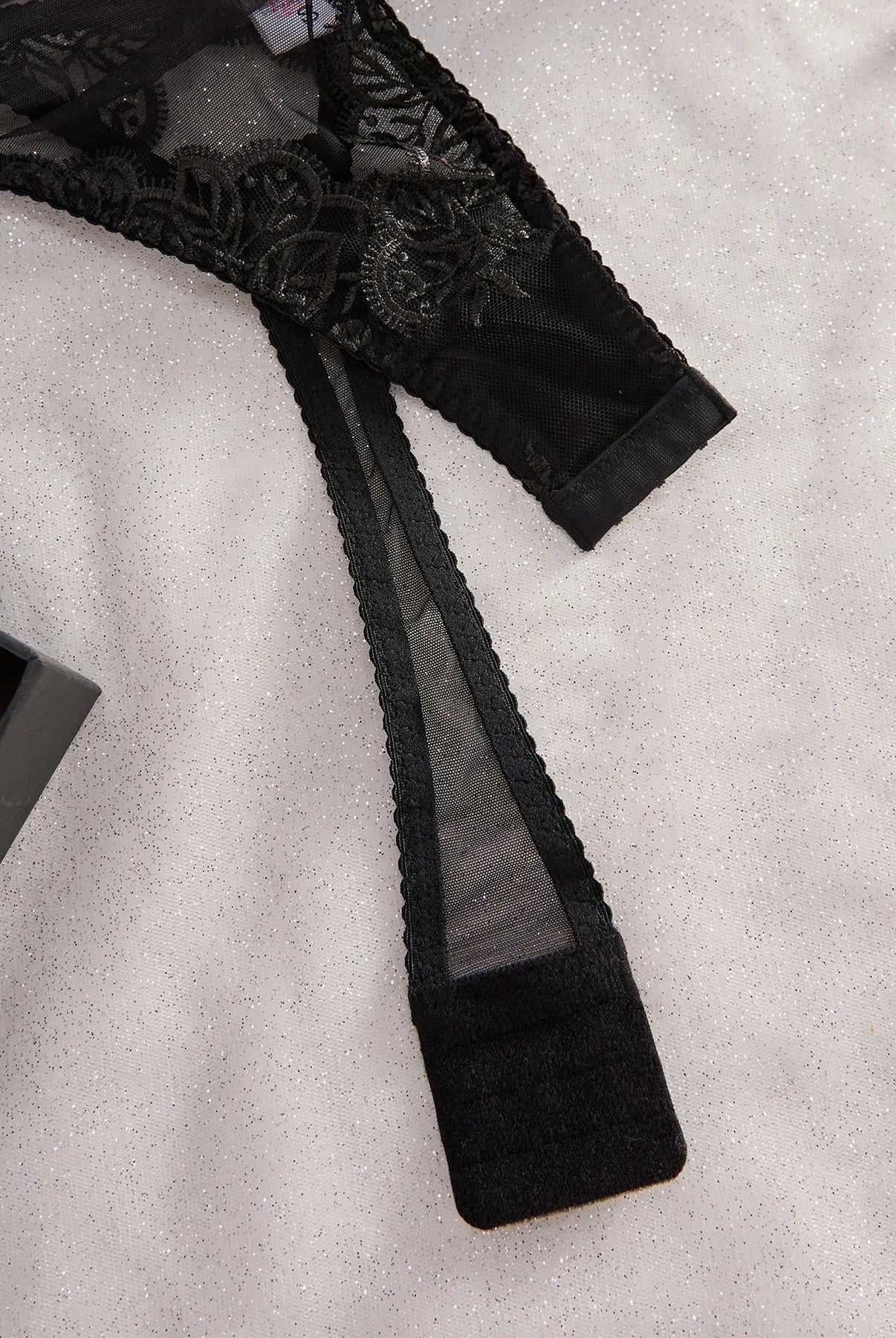 Noemi S bodysuit by Lumina Wear featuring a fitted black bodysuit with long sleeves and scoop neckline.