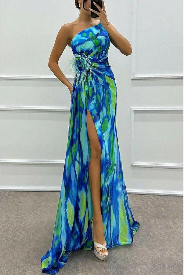 Noemi vibrant blue maxi dress by Lumina Wear, flowing fabric, perfect for wedding guests, worn by a model.