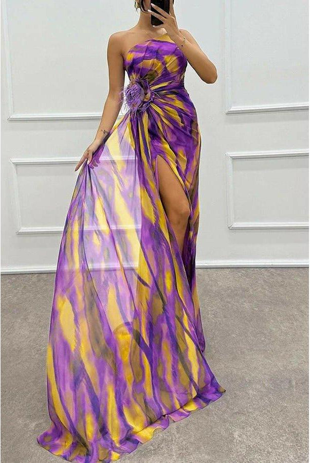 Noemi vibrant blue maxi dress by Lumina Wear, perfect for wedding guests, shown in a flowing, colorful design.