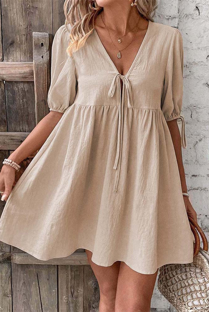 Lumina Wear Alys A-Line Mini Dress with deep V-neck in khaki, stylish and fitted for a chic daytime look.