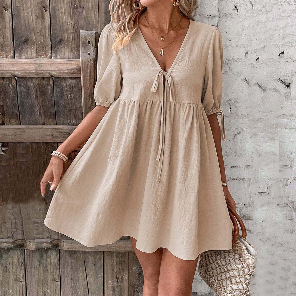 Lumina Vancouver Alys A-Line Mini Dress with deep V-neck in khaki, showing its stylish silhouette and elegant design.