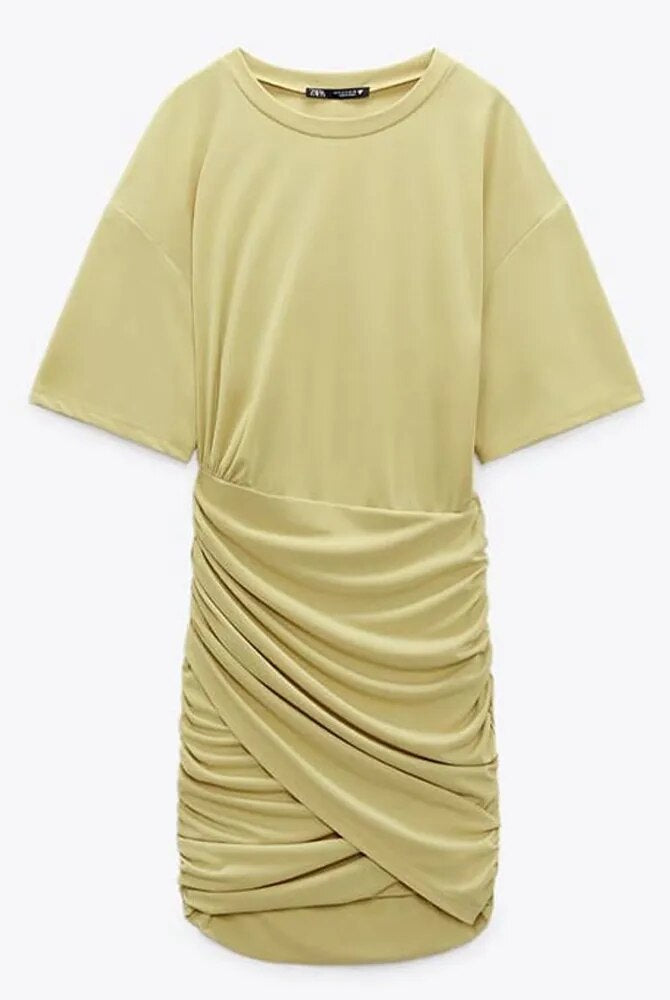 Yellow Lumina Wear Fiadh bodycon mini dress with short sleeves, fitted design, and stylish silhouette.
