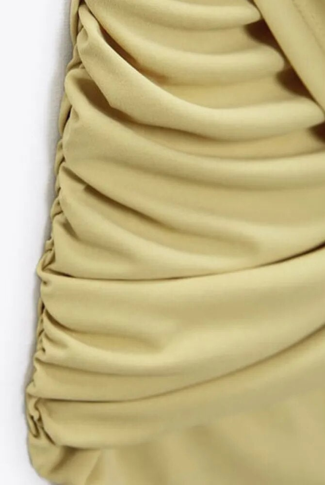 Yellow Lumina Wear Fiadh bodycon mini dress with short sleeves, fitted silhouette, and stylish design.