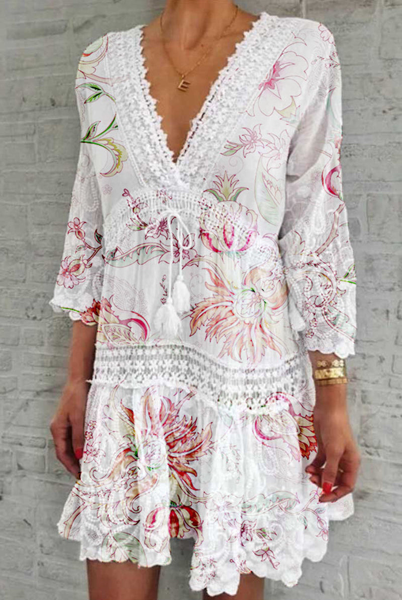 Red Nova boho mini dress with deep V-neck by Lumina Vancouver, featuring flowy fabric and casual bohemian style.
