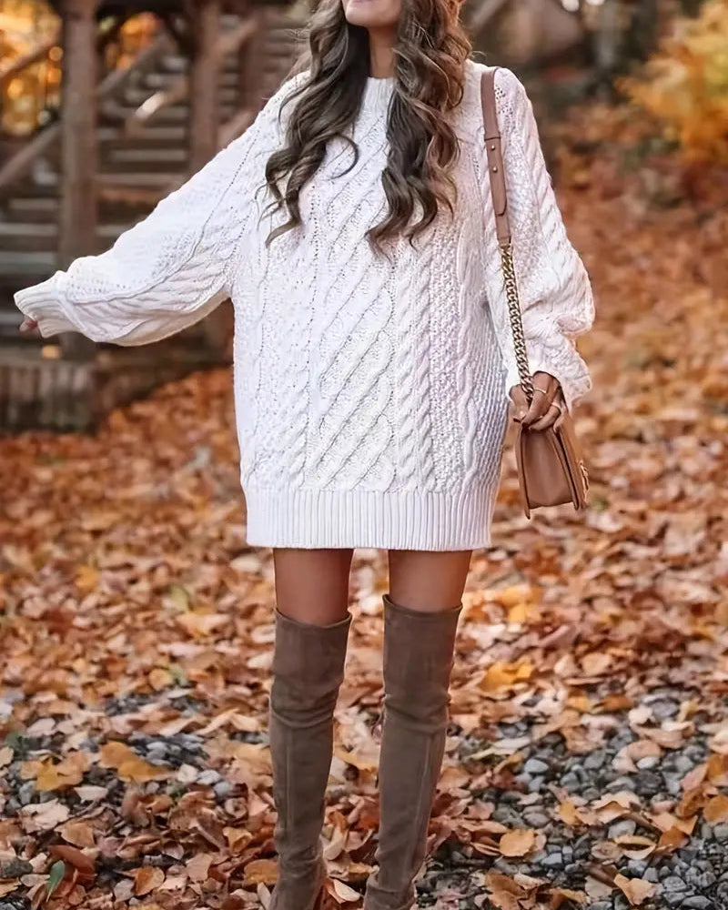 White Nova Cable Braided Sweater Dress by Lumina Wear, showcasing a fitted mini dress with intricate knit details.