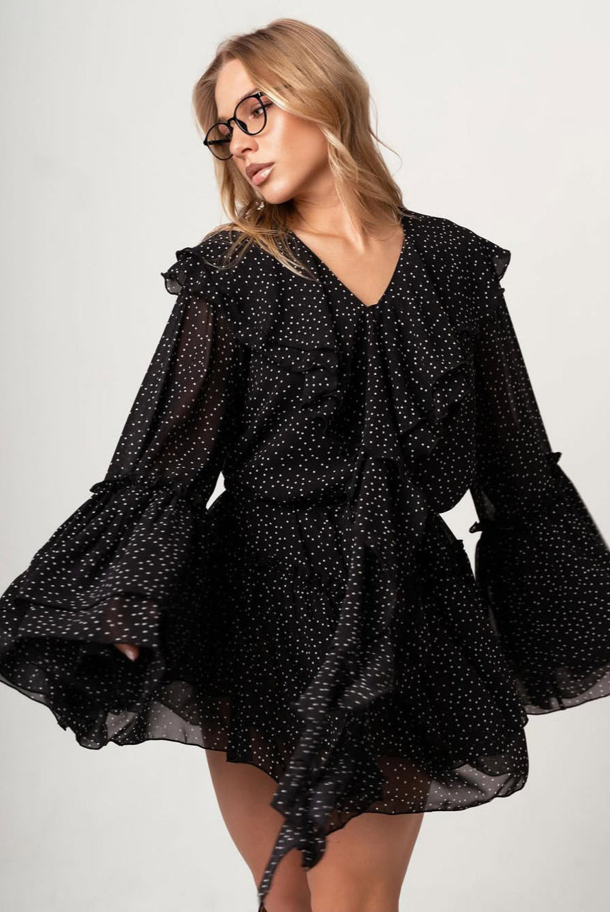 Black Corinna chiffon fit and flare mini dress by Lumina Wear, featuring a stylish silhouette and lightweight fabric.