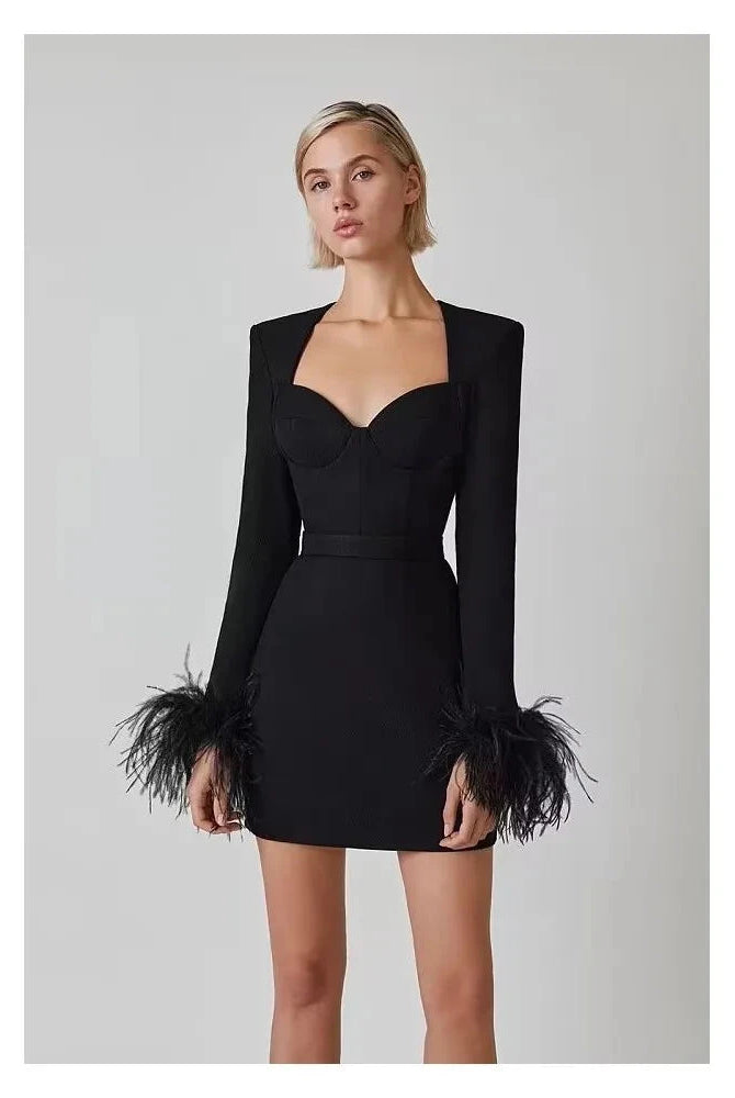 Black Nova mini cocktail dress by Lumina Wear featuring a sleek fit, sleeveless design, and elegant style for special occasions.