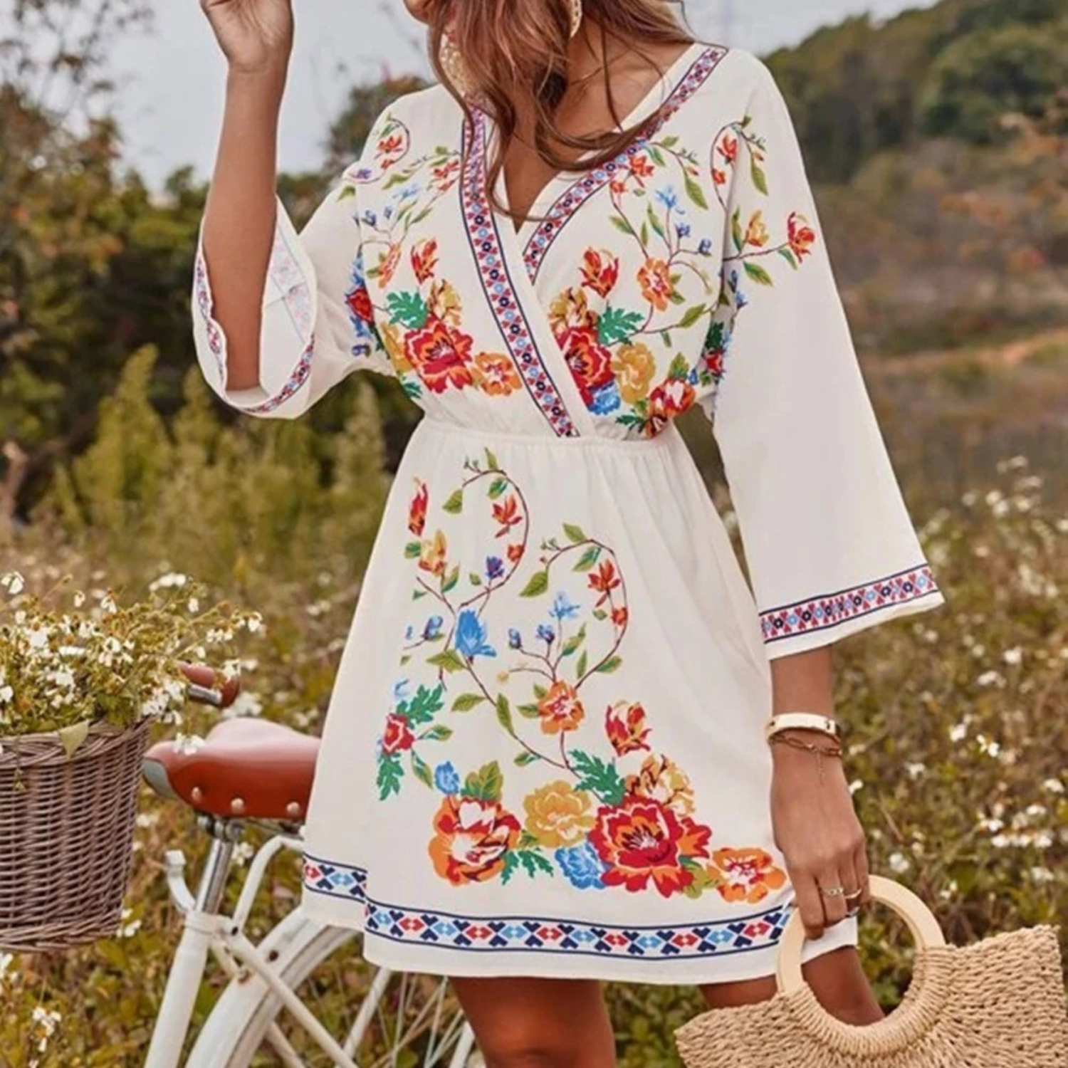 Pink and red floral print V-neck mini dress by Lumina Vancouver, featuring a fitted silhouette and short sleeves.