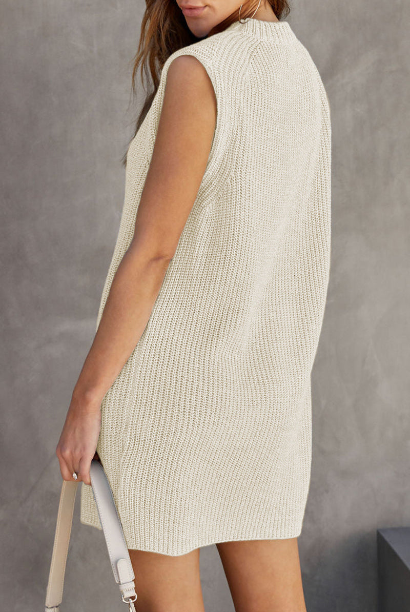 Apricot sleeveless knitted sweater dress by Lumina Vancouver, mini length with a cozy, textured knit design.