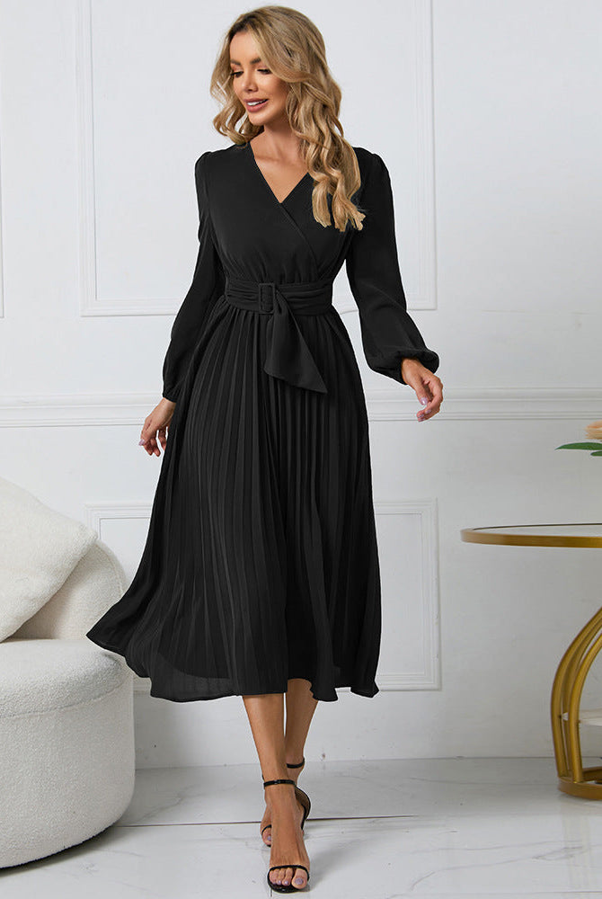 Pink Nova long-sleeved V-neck pleated mini dress by Lumina Wear, shown on a model with a stylish, feminine design.