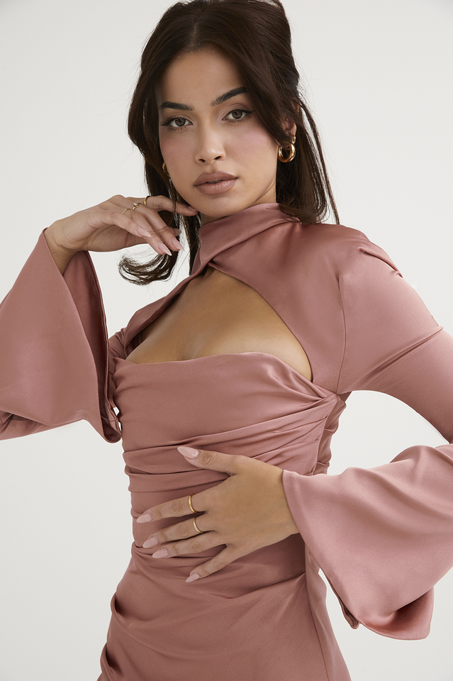 Ivory satin mini dress with twisted neckline by Lumina Vancouver, displayed on a model against a neutral background