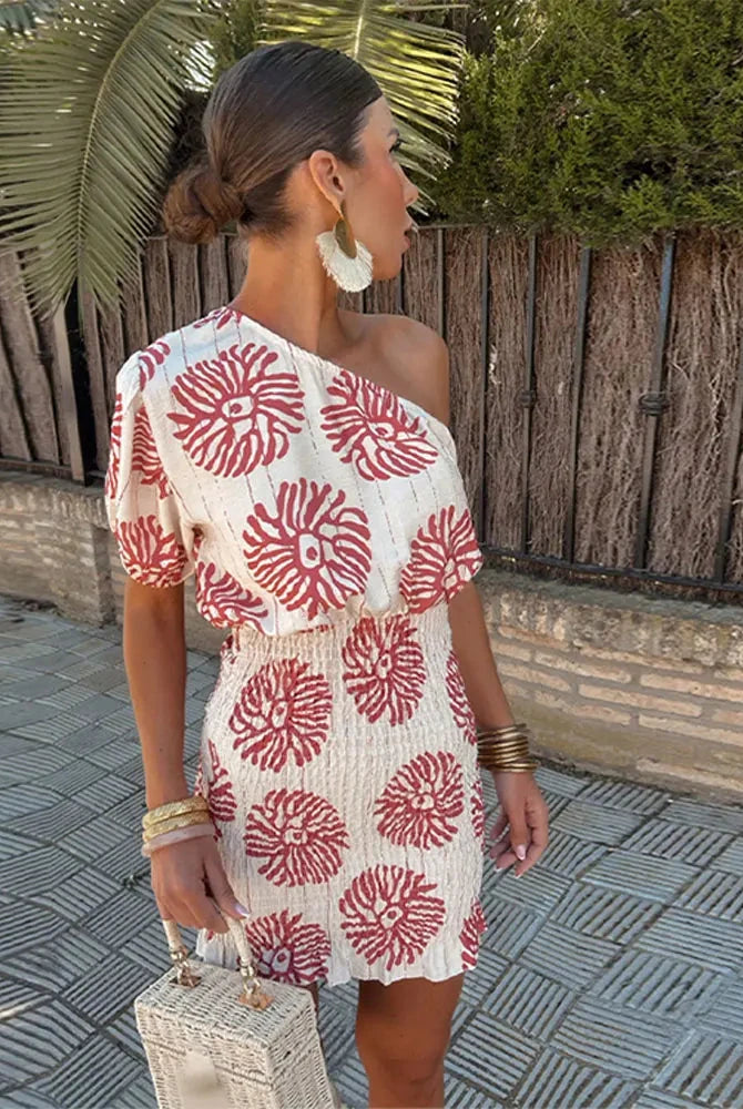 White and red asymmetrical Nova one-shoulder mini dress by Lumina Vancouver, featuring a stylish, modern design.