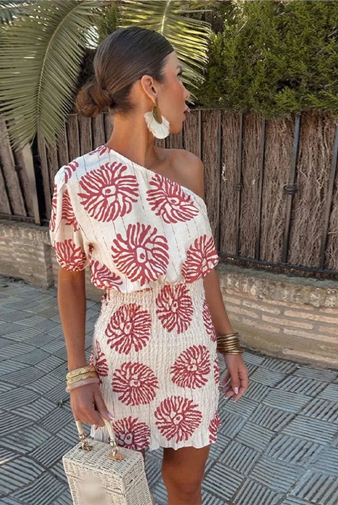 White and red Nova Lumina one-shoulder asymmetrical mini dress with stylish design, from Lumina Vancouver.