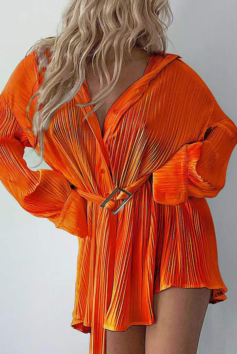 Black Nova pleated mini shirt dress by Lumina Vancouver, featuring a stylish collar and button-front design.