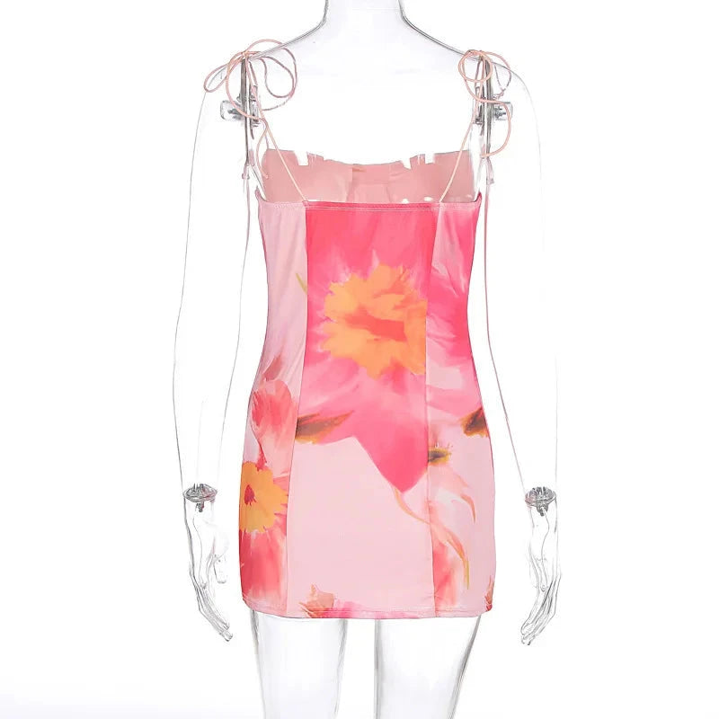 Satin strapless mini dress by Lumina Vancouver with a bodycon fit, shown in a sleek, elegant style on a model.